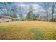 Expansive backyard perfect for outdoor activities and gatherings, surrounded by mature trees at 2104 Barbara Ln, Decatur, GA 30032