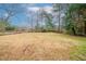 Large backyard with dead grass at 2104 Barbara Ln, Decatur, GA 30032