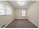 Bedroom features neutral carpet and lots of natural light at 2104 Barbara Ln, Decatur, GA 30032