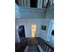 Staircase leading to upstairs hallway with bedroom and bathroom doors at 2208 Ginger Lake Ne Dr, Conyers, GA 30013