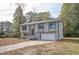Updated 2-story home with a large yard and attractive facade at 1381 Flat Rock Rd, Stockbridge, GA 30281