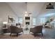Bright and airy living room featuring vaulted ceilings, ceiling fan, fireplace, and neutral paint at 270 Merrydale Dr, Fayetteville, GA 30215