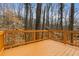 Wooden deck with a beautiful view of the surrounding nature at 1271 Marcelle Heights Pl, Norcross, GA 30093