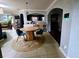 Dining room with round wooden table and blue chairs at 13391 Henderson Dr, Hampton, GA 30228