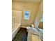 Bathroom featuring tub, granite countertop vanity, and hexagon tile flooring at 3740 Cobblestone Dr, Loganville, GA 30052