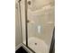 New bathroom with shower and glass door with black marble tile at 3740 Cobblestone Dr, Loganville, GA 30052