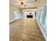 Bright and spacious living room with hardwood floors and plenty of natural light at 3740 Cobblestone Dr, Loganville, GA 30052