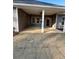 Covered patio area with a ceiling fan, offering a relaxing outdoor space at 3740 Cobblestone Dr, Loganville, GA 30052