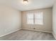 This carpeted bedroom has neutral colored walls and a window with blinds at 265 N Fayette Ct, Fayetteville, GA 30214