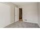 Bedroom featuring neutral walls, carpet floors and a spacious closet at 265 N Fayette Ct, Fayetteville, GA 30214