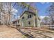 Side view of a two-story home with a large backyard at 265 N Fayette Ct, Fayetteville, GA 30214