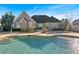 Relaxing backyard with a kidney-shaped pool and brick coping at 521 James Ridge Ln, Stockbridge, GA 30281