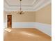 Formal dining room with hardwood floors and chandelier at 521 James Ridge Ln, Stockbridge, GA 30281