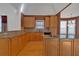 Spacious kitchen with granite countertops and light wood cabinets at 521 James Ridge Ln, Stockbridge, GA 30281