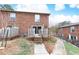 Backyard with a brick patio and walkway at 5672 Kingsport Dr # 4, Atlanta, GA 30342