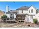 Charming home featuring a spacious deck and screened-in porch, perfect for outdoor living and entertaining at 1302 Turtlebrook Ln, Lawrenceville, GA 30043