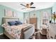 Stylish bedroom features hardwood floors and natural light, creating a relaxing ambiance at 1302 Turtlebrook Ln, Lawrenceville, GA 30043