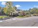 Charming community clubhouse featuring stone accents, well-maintained landscaping, and convenient parking at 1302 Turtlebrook Ln, Lawrenceville, GA 30043