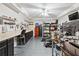 Organized garage area featuring ample workspace, storage cabinets, and a diamond pattern floor at 1302 Turtlebrook Ln, Lawrenceville, GA 30043