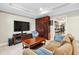 Relaxing Gathering room area complete with a large screen television and comfortable seating at 1302 Turtlebrook Ln, Lawrenceville, GA 30043