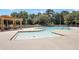 Inviting community swimming pool and lounge chairs offer a perfect spot for summer relaxation and recreation at 1302 Turtlebrook Ln, Lawrenceville, GA 30043
