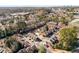 Aerial view of townhome community, pool, and surrounding area at 2251 Pernoshal Ct, Atlanta, GA 30338