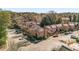 Aerial view of townhome community with parking and landscaping at 2251 Pernoshal Ct, Atlanta, GA 30338