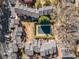 Aerial view of townhome community with pool and parking at 2251 Pernoshal Ct, Atlanta, GA 30338