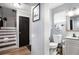 Updated bathroom with a single sink vanity and a toilet at 2251 Pernoshal Ct, Atlanta, GA 30338