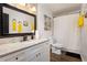 Clean bathroom with a shower/tub combo, vanity, and modern fixtures at 2251 Pernoshal Ct, Atlanta, GA 30338