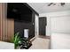 Bedroom with a large TV and adjacent closet at 2251 Pernoshal Ct, Atlanta, GA 30338