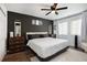 Private bedroom with large bed and plenty of natural light at 2251 Pernoshal Ct, Atlanta, GA 30338