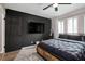 Main bedroom with a large TV, ceiling fan, and walk-in closet at 2251 Pernoshal Ct, Atlanta, GA 30338