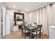 Dining room with four chairs and a fireplace at 2251 Pernoshal Ct, Atlanta, GA 30338