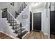 Entryway with black door and staircase at 2251 Pernoshal Ct, Atlanta, GA 30338