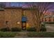 Brick building exterior with a blue awning and walkway at 2251 Pernoshal Ct, Atlanta, GA 30338
