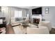 Living room with fireplace and comfy seating at 2251 Pernoshal Ct, Atlanta, GA 30338
