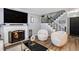 Living room with fireplace and comfy seating at 2251 Pernoshal Ct, Atlanta, GA 30338