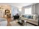Living room with sofa and dining room view at 2251 Pernoshal Ct, Atlanta, GA 30338