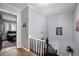 Upstairs hallway with access to bedrooms and stairs at 2251 Pernoshal Ct, Atlanta, GA 30338