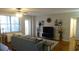 Open-concept living area with a kitchen featuring modern appliances at 300 W Peachtree St # 21N, Atlanta, GA 30308