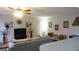 Relaxing living room space features a ceiling fan and neutral paint at 300 W Peachtree St # 21N, Atlanta, GA 30308