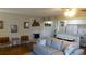 Open-concept living room adjacent to the kitchen is great for entertaining at 300 W Peachtree St # 21N, Atlanta, GA 30308