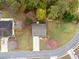 Aerial view of the home and property showcasing the mature landscaping and neighborhood at 296 Cedar Bay Cir, Dallas, GA 30157