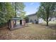 A beautiful backyard with a gazebo, lush trees, and a well-maintained lawn creates a relaxing outdoor space at 296 Cedar Bay Cir, Dallas, GA 30157