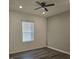 Bedroom with ceiling fan and gray flooring at 35 Meriwether Dr, Villa Rica, GA 30180