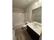 View of modern bathroom with shower and vanity at 7889 Winkman Dr, Fairburn, GA 30213