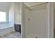 Bathroom featuring a bathtub, shower and vanity with dark wood cabinetry at 7889 Winkman Dr, Fairburn, GA 30213