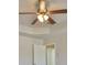 Close-up shot of a ceiling fan in a room with an open door at 7889 Winkman Dr, Fairburn, GA 30213