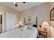Bedroom shows a four-poster bed, bedside table, and neutral-colored walls at 1965 Nocturne Dr # 1205A, Alpharetta, GA 30009